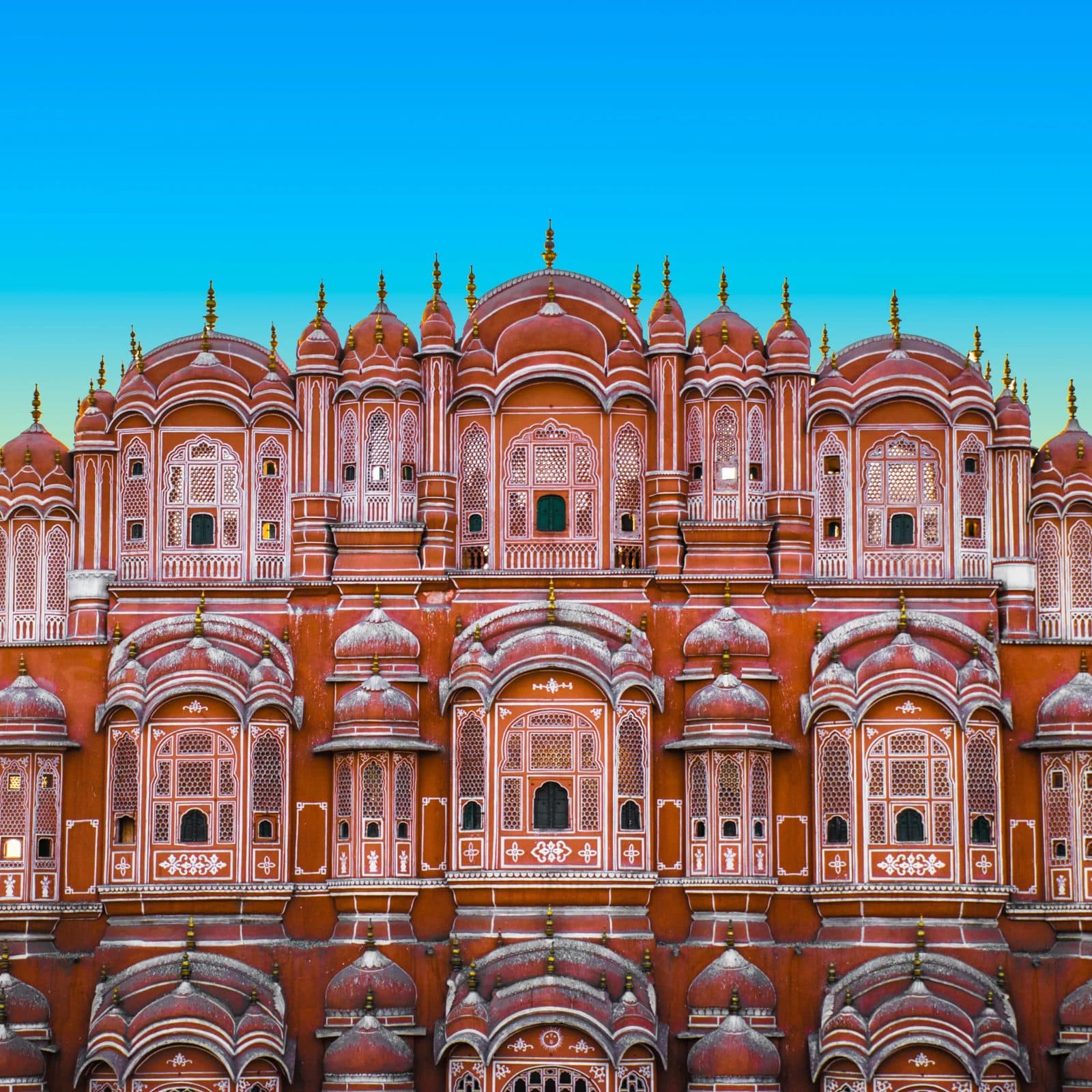 The honeycomb pink-sandstone facade of the Hawa Mahal in Jaipur