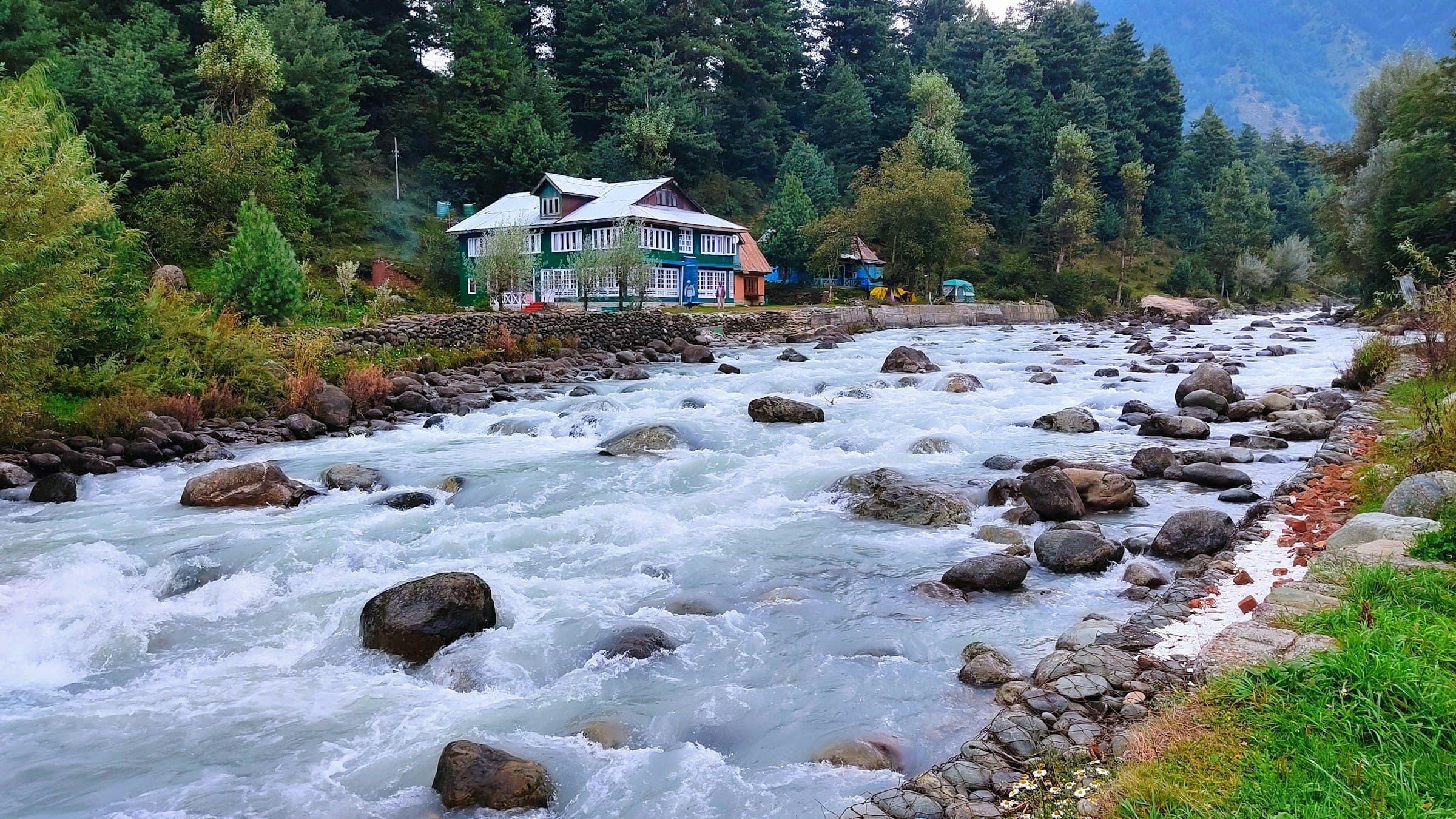 River winding through a forested valley near Pahalgam, Kashmir