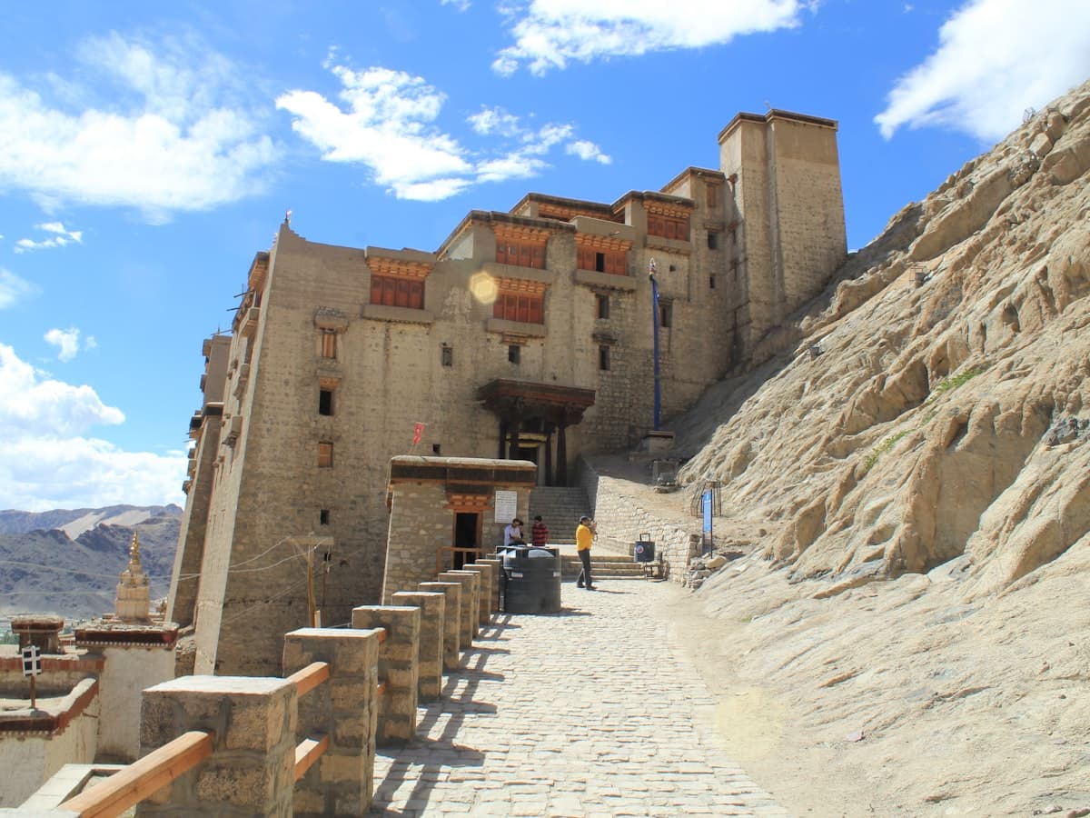 The nine-storey Leh Palace rising from the rock above Leh's old town, the former seat of Ladakh's Namgyal kings, modelled on Lhasa's Potala.