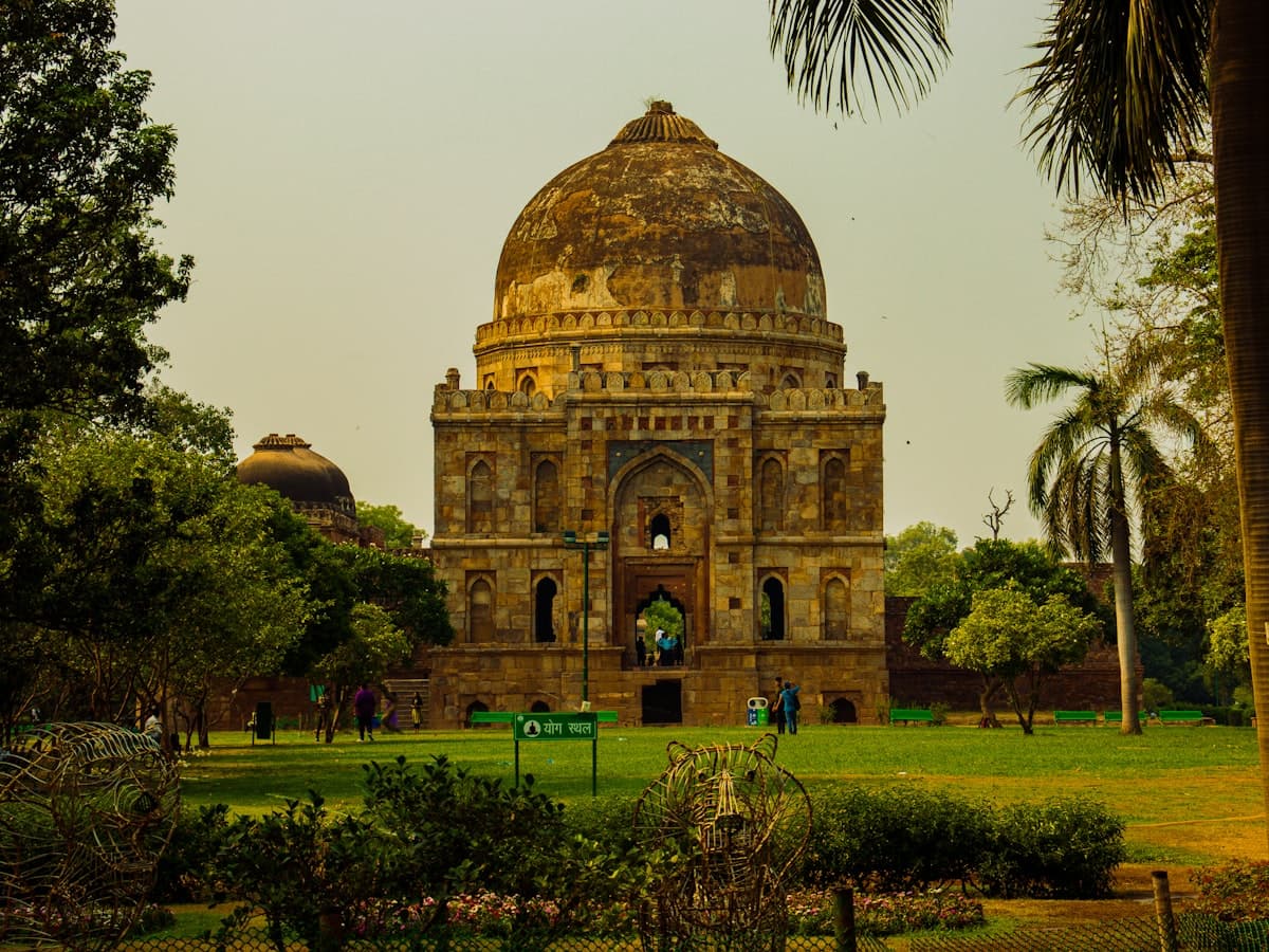 A domed medieval mausoleum of the Lodhi and Sayyid dynasties set among lawns and old trees in Lodhi Garden, New Delhi.