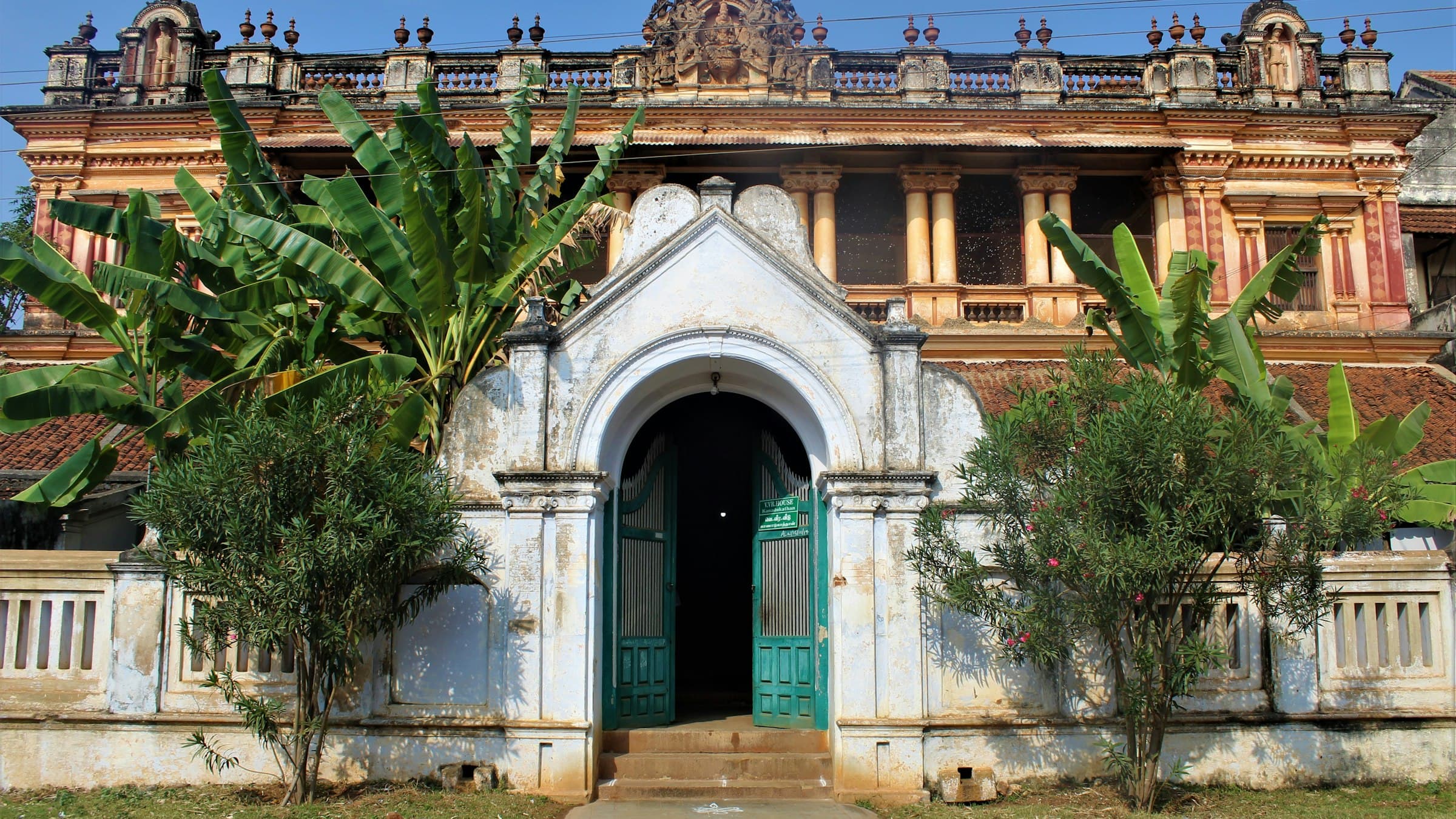 A large old house set among trees in the Chettinad region of Tamil Nadu.