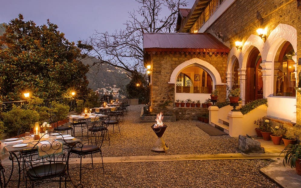 Alfresco terrace dining area at Gurney House restaurant, The Naini Retreat, Nainital.