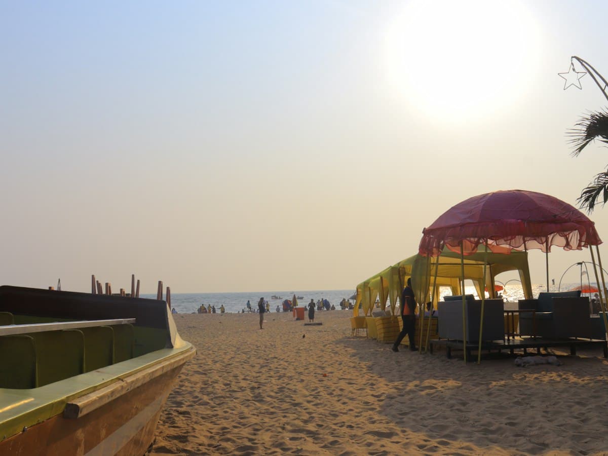 Baga Beach with palms and sun loungers, North Goa