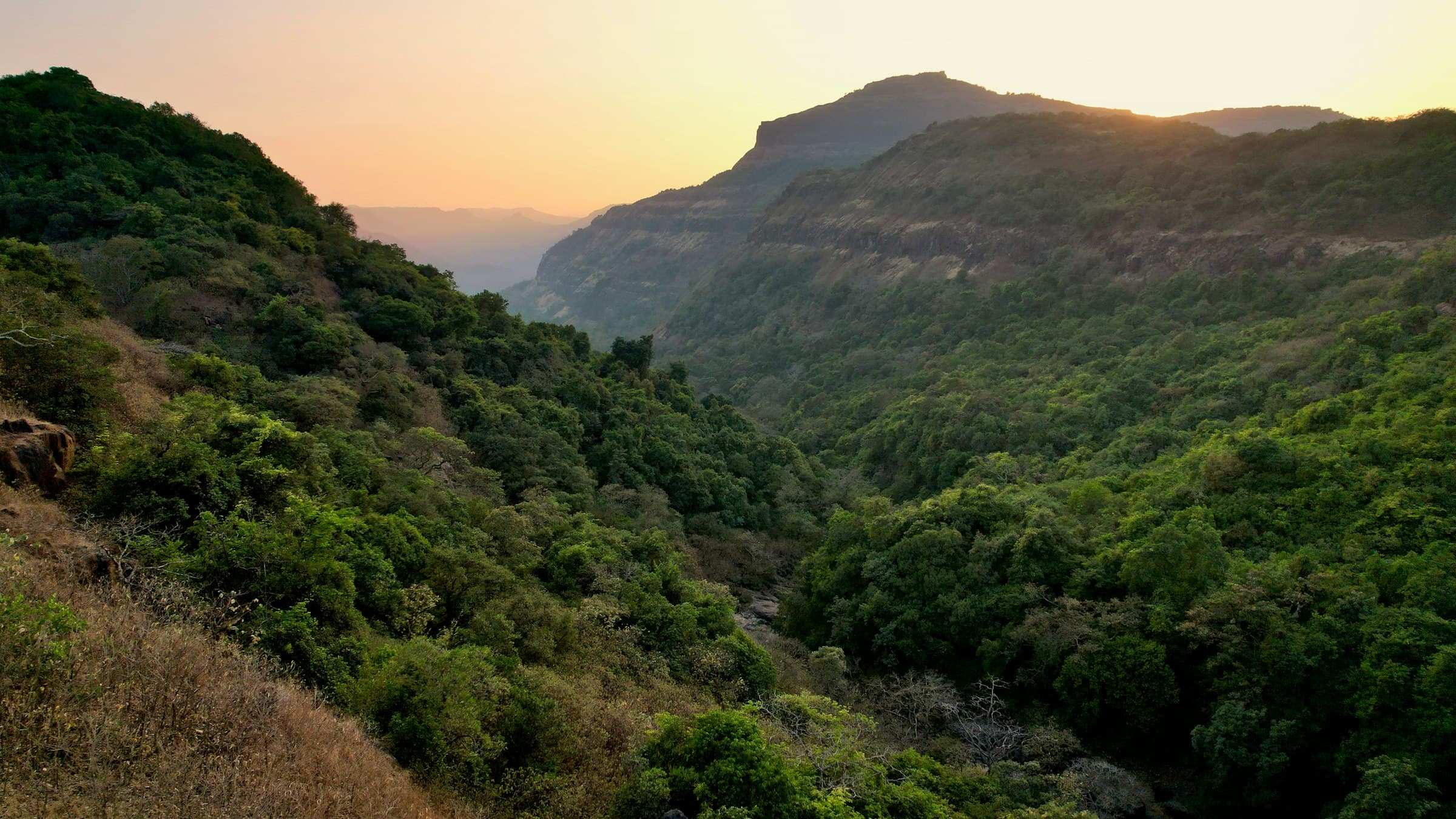 Sunset over the layered Sahyadri hills of the Western Ghats near Lonavala, Maharashtra