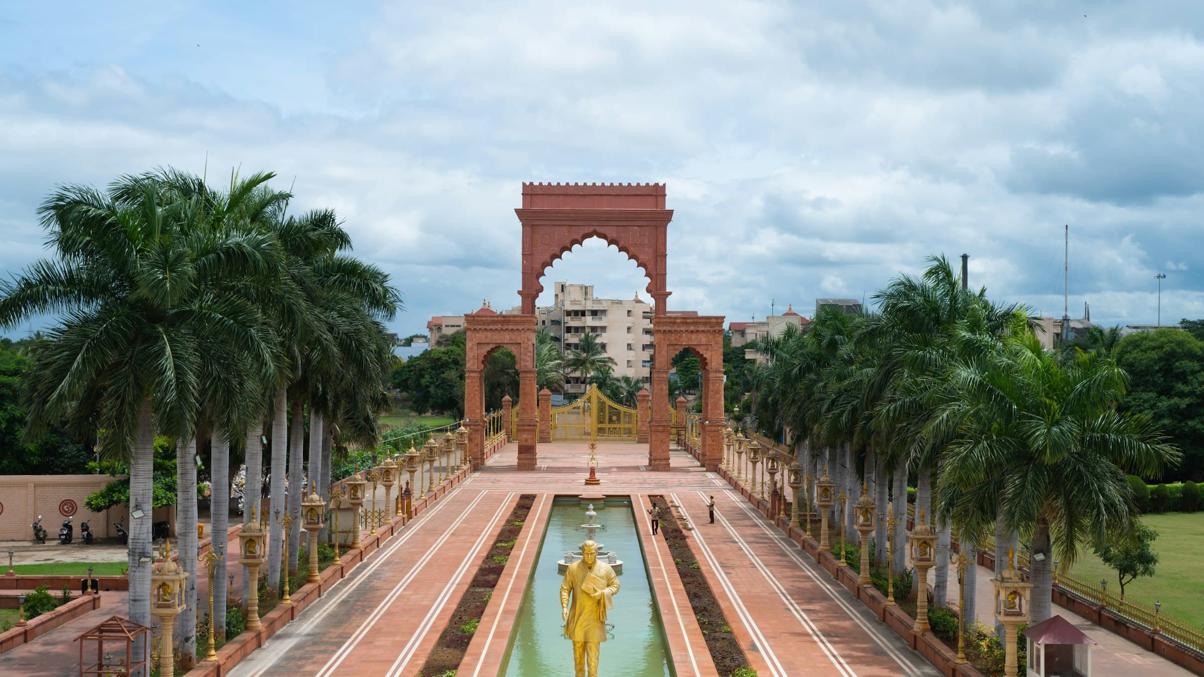 The World Peace Dome and its fountain garden under blue sky in Pune, Maharashtra