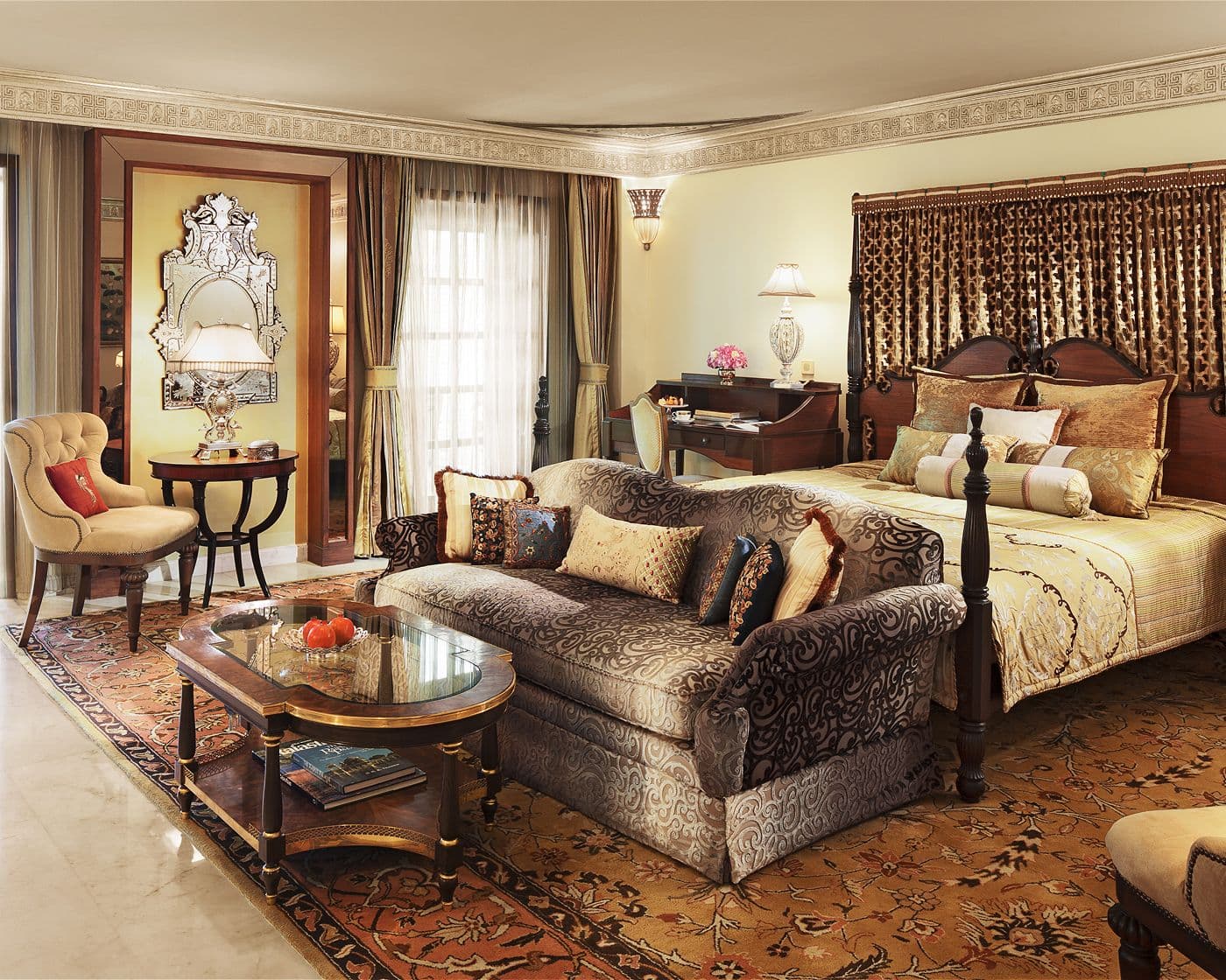 The twin-bed layout of a Palace Room at Rambagh Palace, Jaipur, with matching headboards and bedside lamps