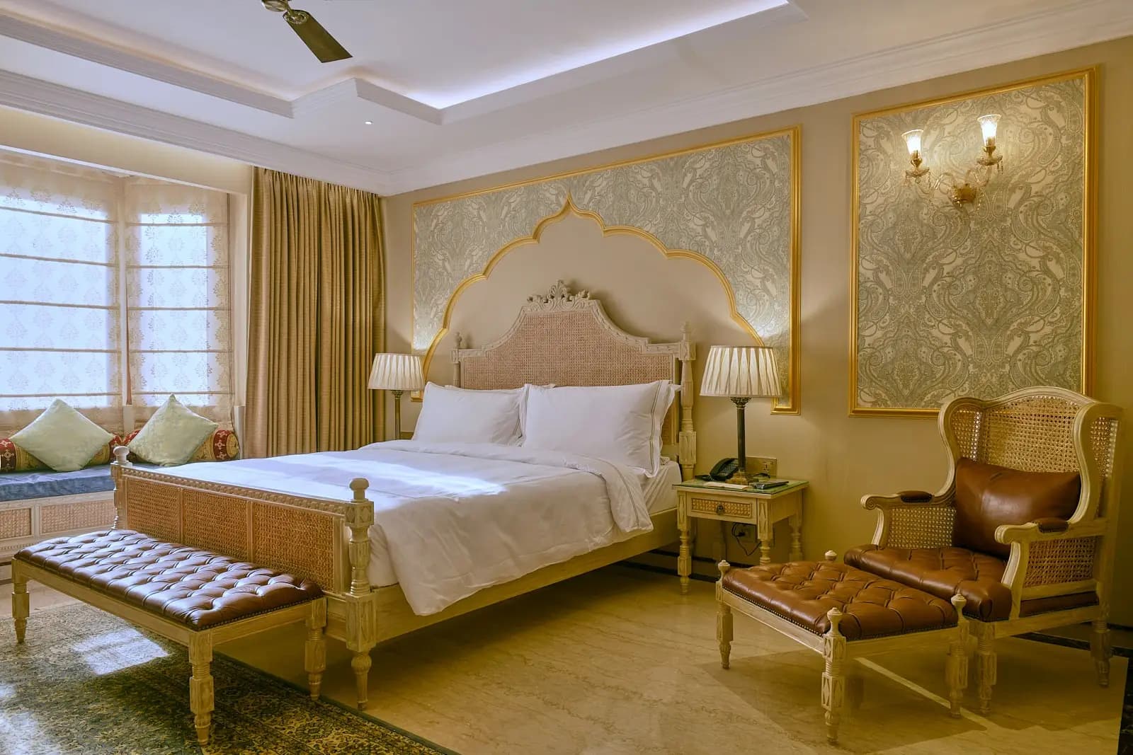 A Royal Palace Room at Fort Rajwada, Jaisalmer, with ornate furnishing and a sitting area