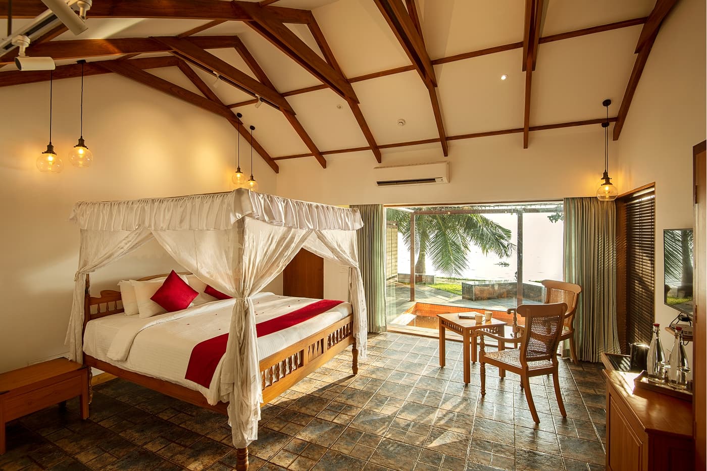 Guest accommodation in Kerala-style blocks at Punnamada Resort, Alleppey