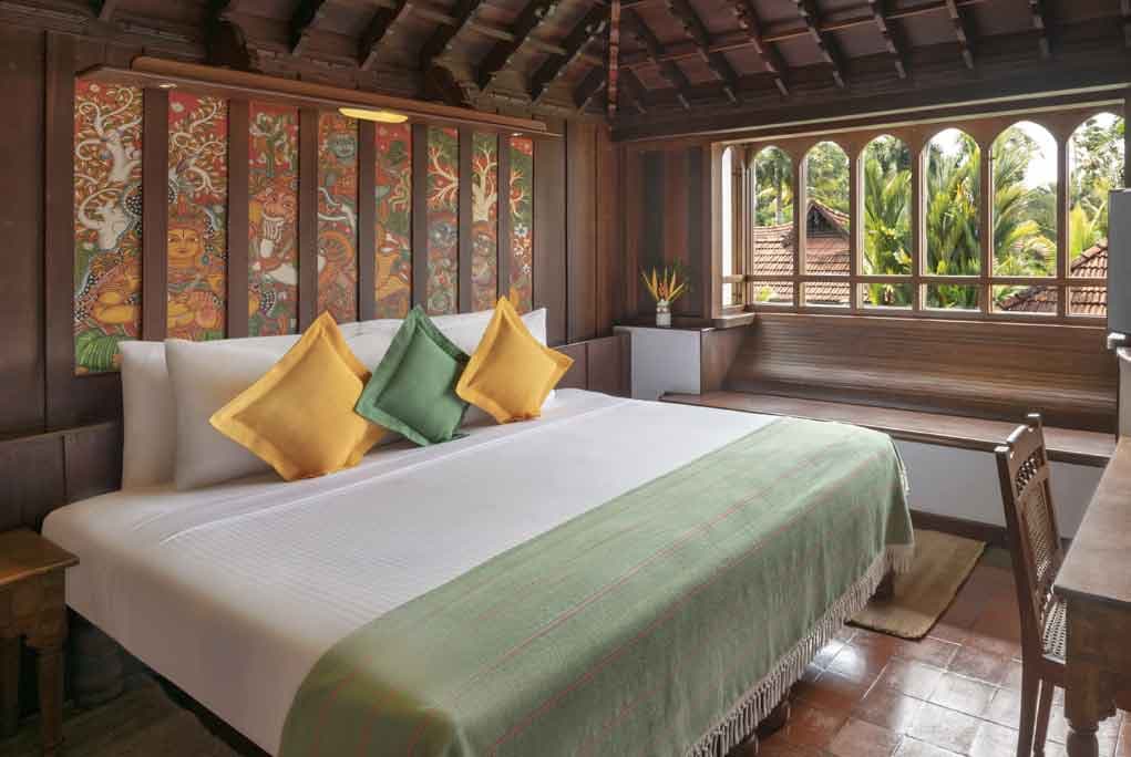 A meandering-pool duplex villa at Kumarakom Lake Resort