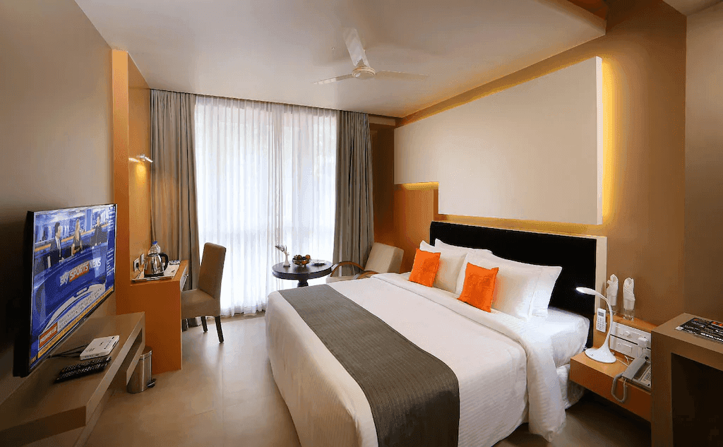 A guest room interior at Vythiri Village Resort
