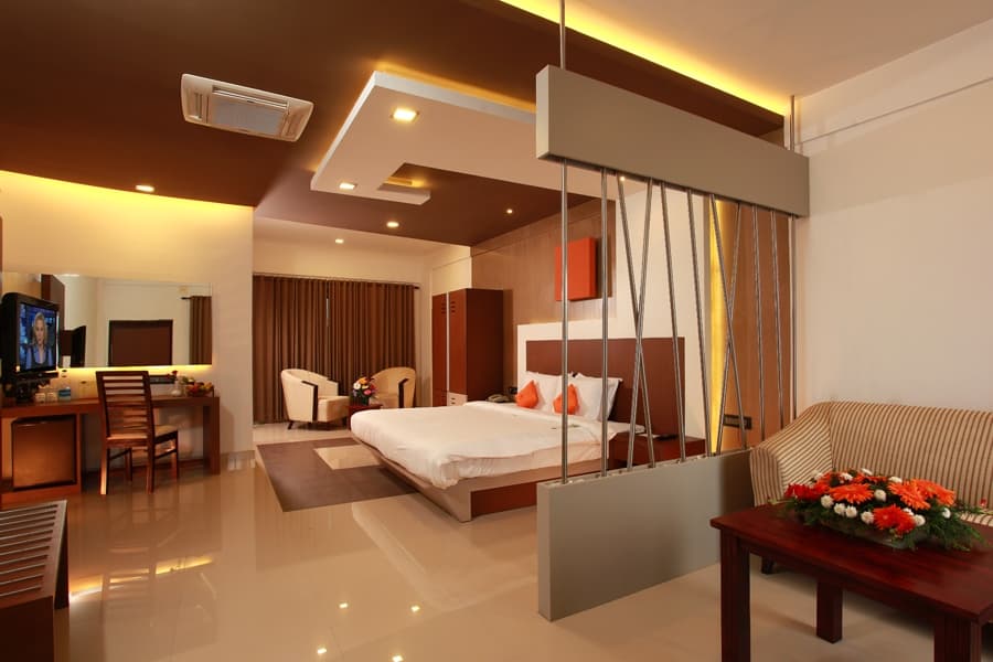 The interior of a cottage at Vythiri Village Resort