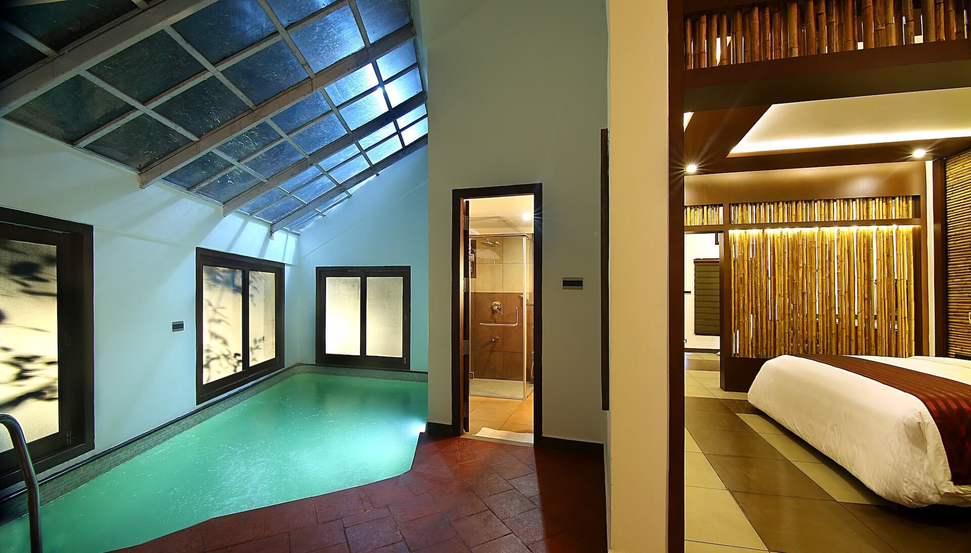 A private pool villa with infinity pool at Vythiri Village Resort