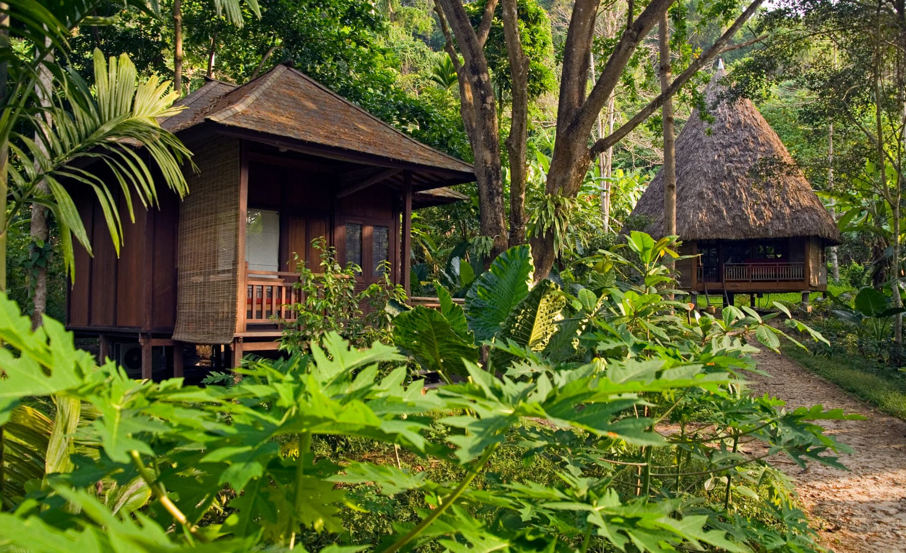 The thatch-and-wood facade of a villa at Barefoot at Havelock