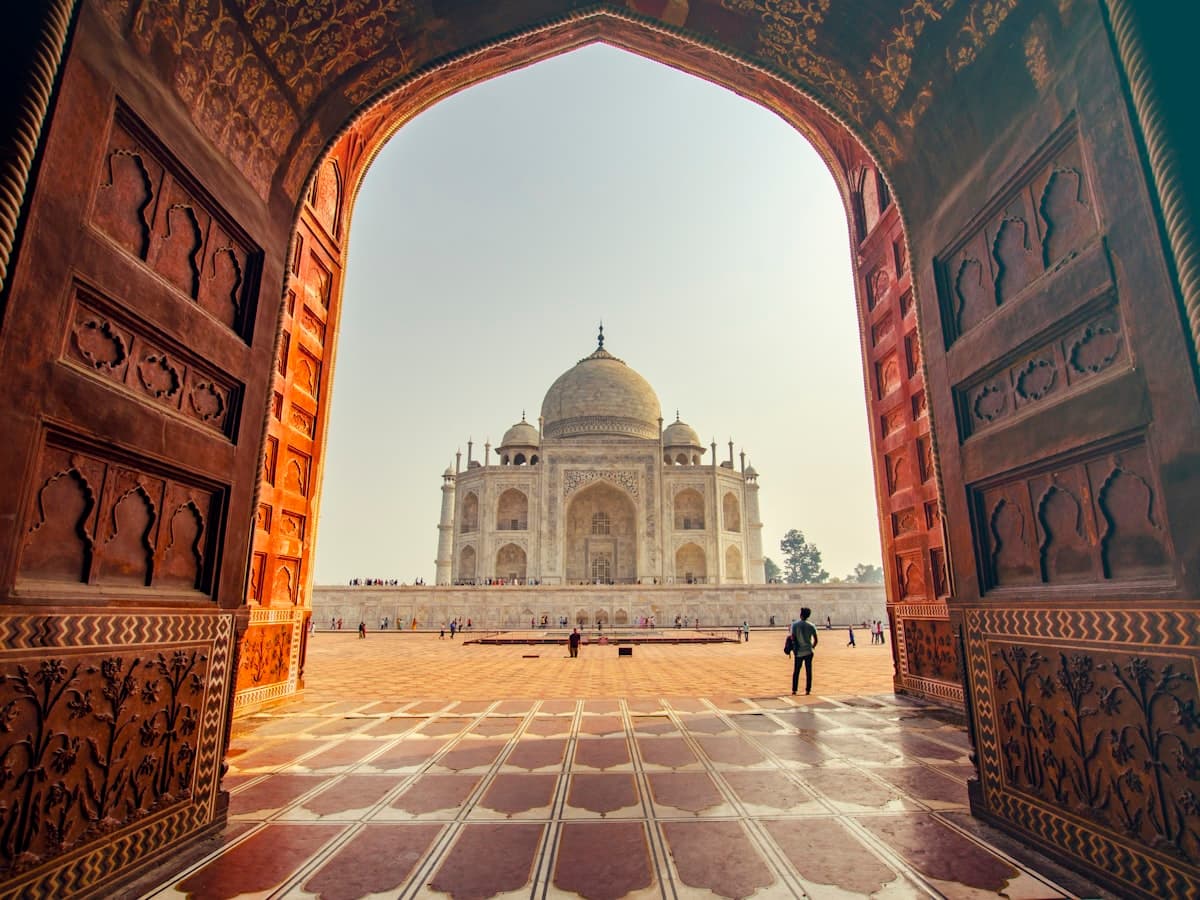 Visitors at the Taj Mahal, Agra, in the soft early light