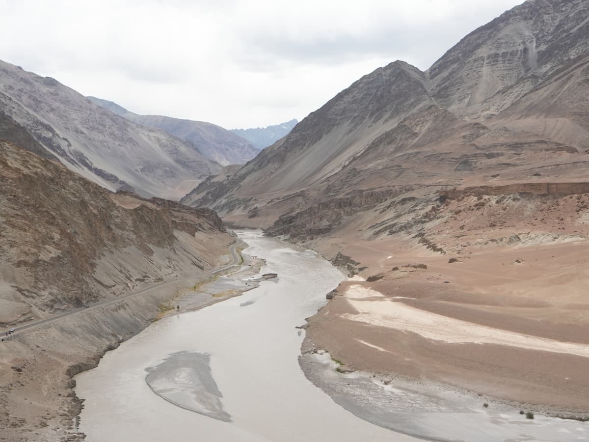 The Sangam near Nimmu, where the Indus and the Zanskar rivers meet below barren Ladakhi ridges on the Srinagar-Leh highway.