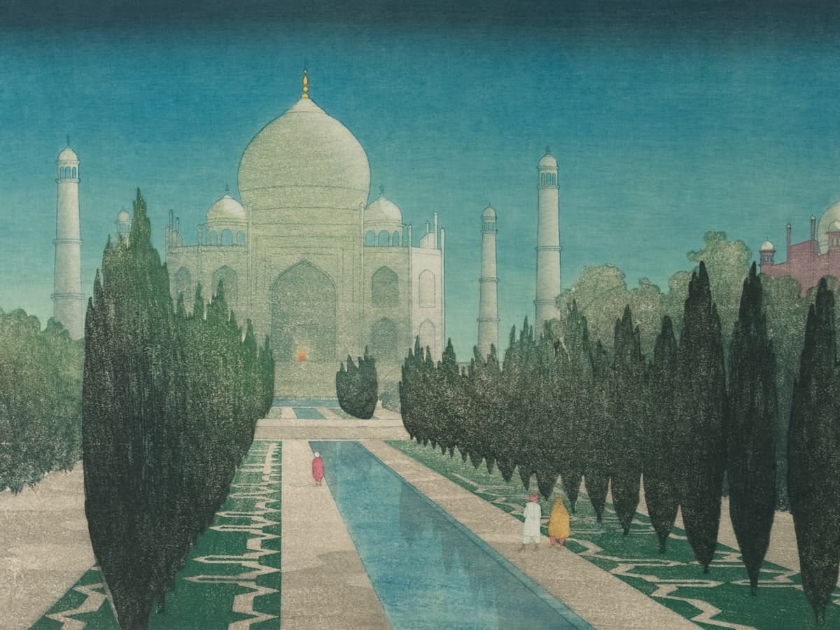 The Taj Mahal viewed down its long reflecting pool and cypress-lined walkway from the garden's forecourt.