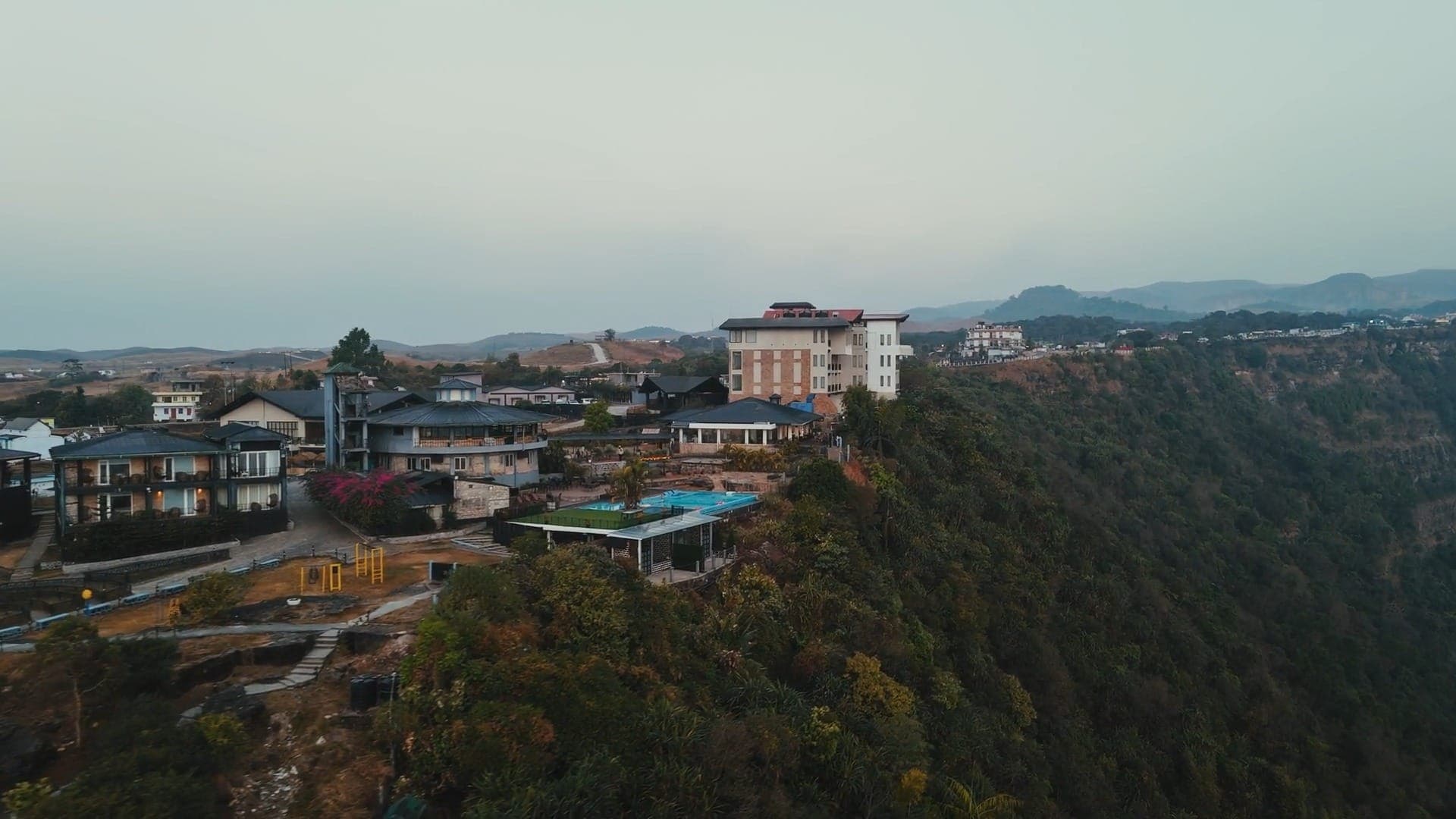 An aerial view of Polo Orchid Resort, Cherrapunji on its canyon-edge estate above the Sohra valley.