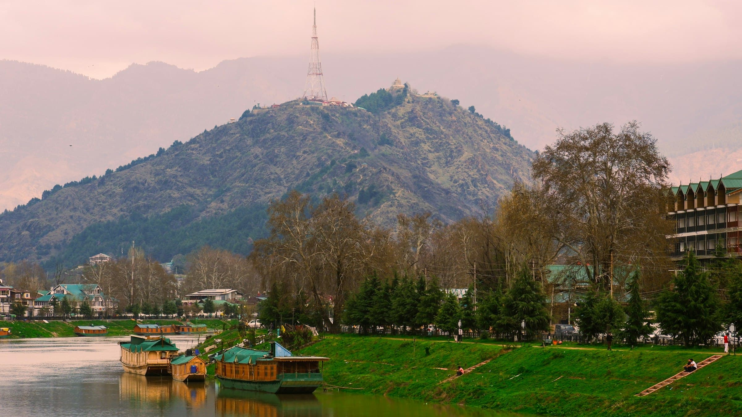 Dal Lake stretching to snow-capped mountains at Srinagar.