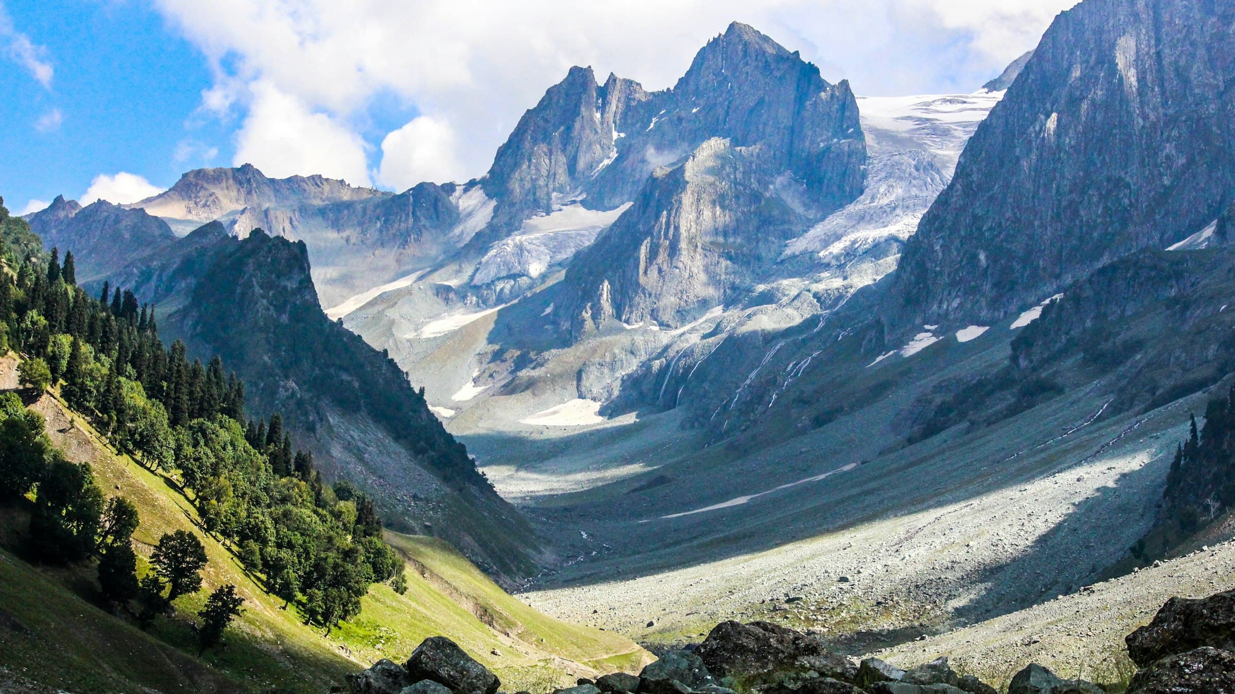 Green and grey mountains under cloud at Thajiwas, Sonamarg.