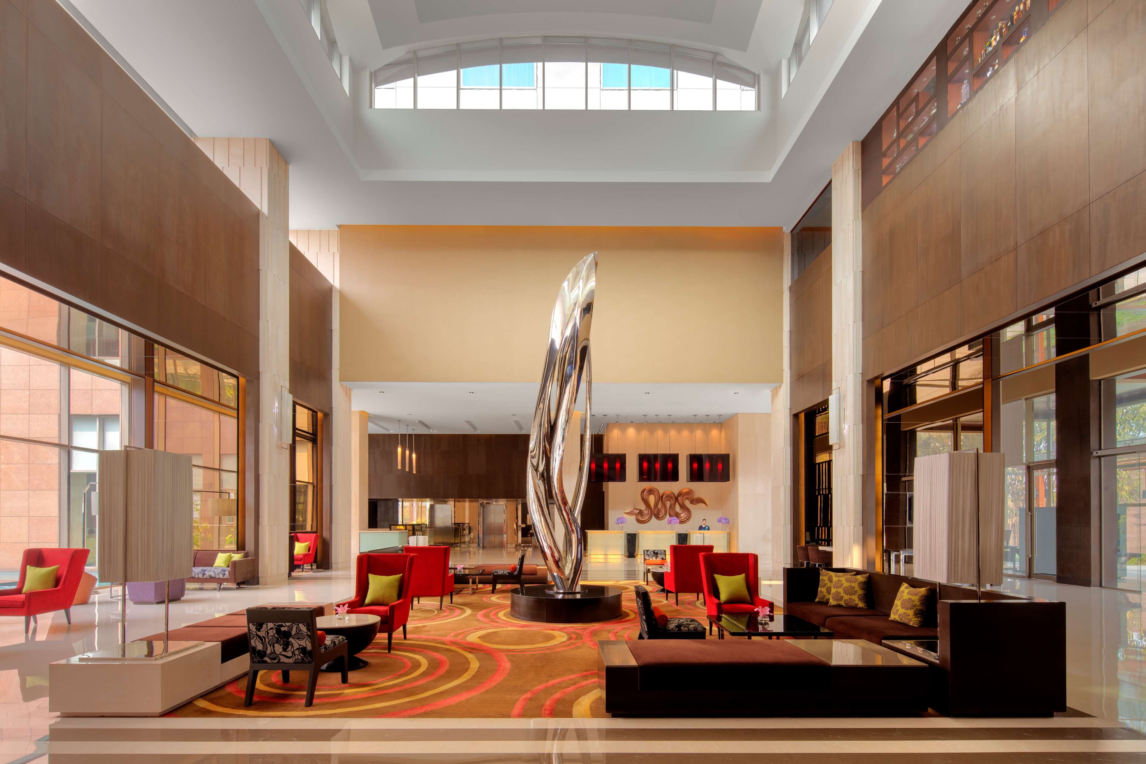 The lobby and lounge area of Radisson Blu Hotel Guwahati.