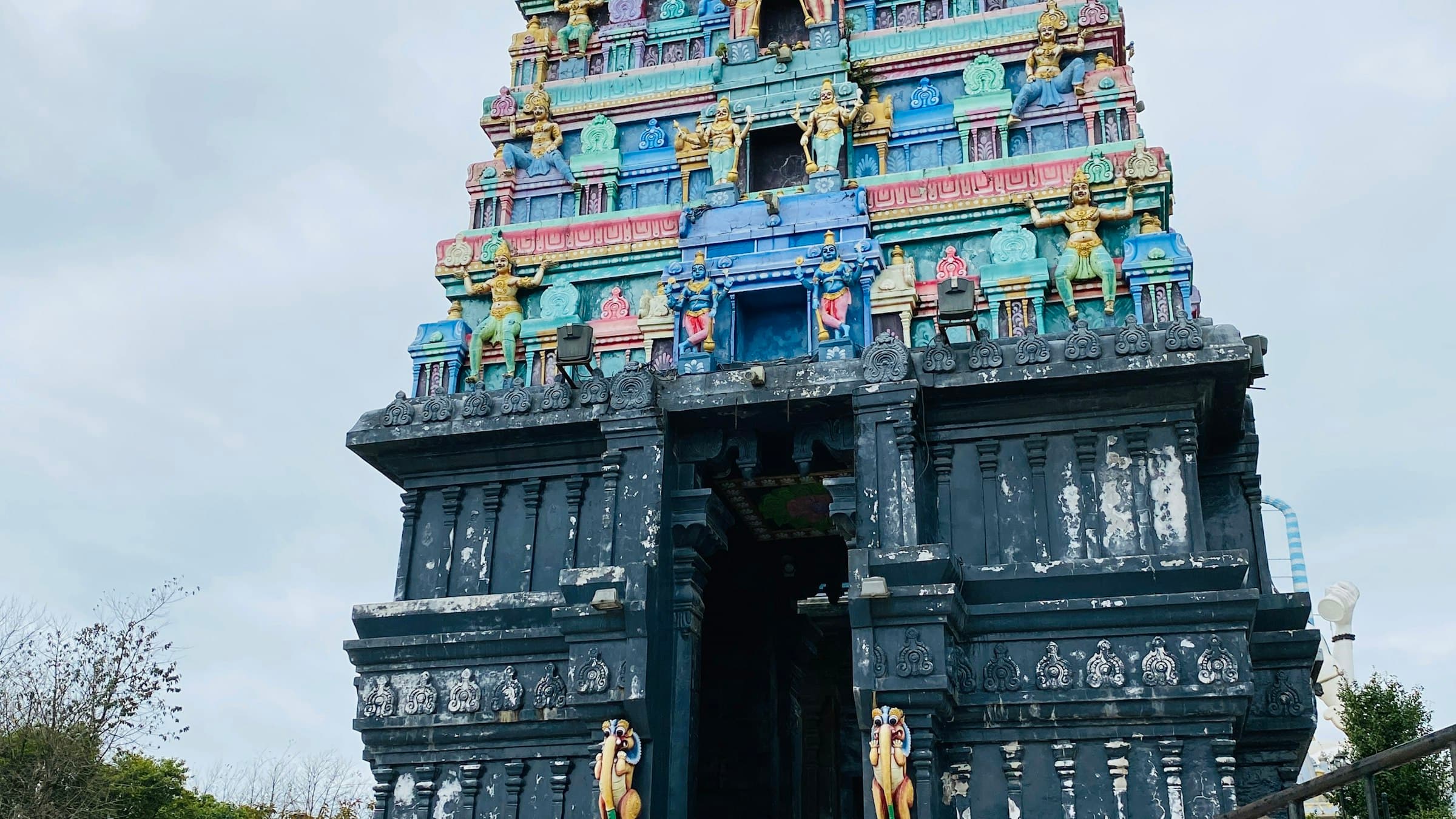 The tiered towers of the Char Dham (Siddhesvara Dham) temple complex at Solophok, Namchi, South Sikkim.