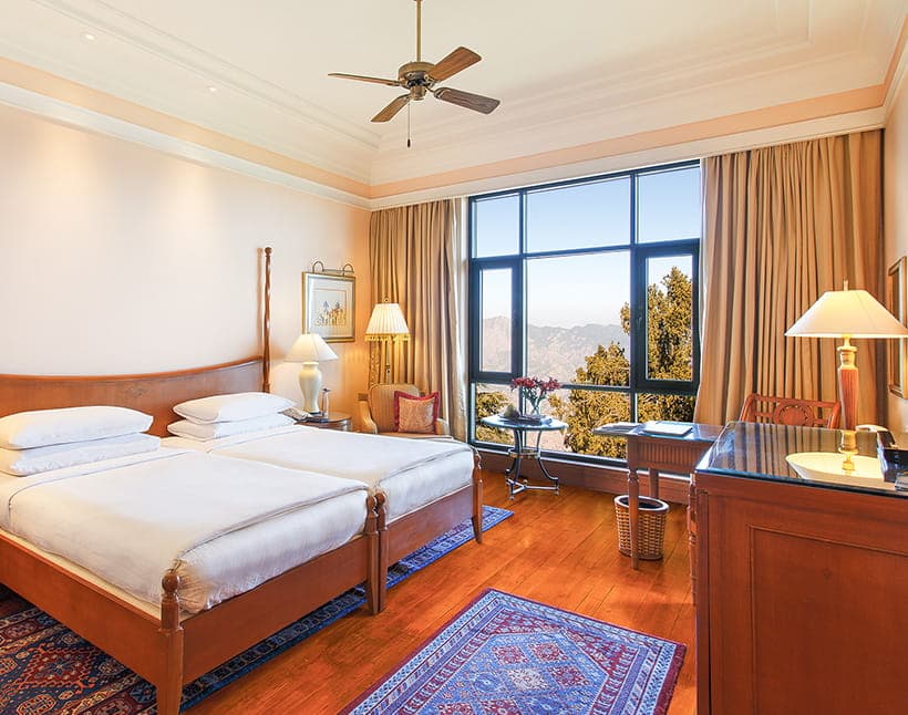 A Premier Mountain View Room at Wildflower Hall, an Oberoi Resort, Shimla.