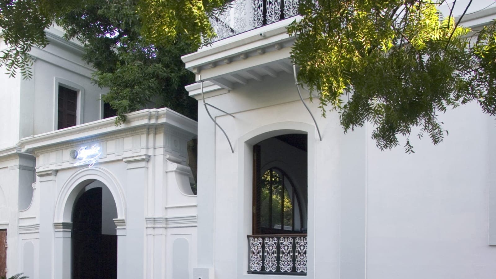White colonial-era facade of Le Dupleix, Pondicherry, an 18th-century mansion hotel in White Town