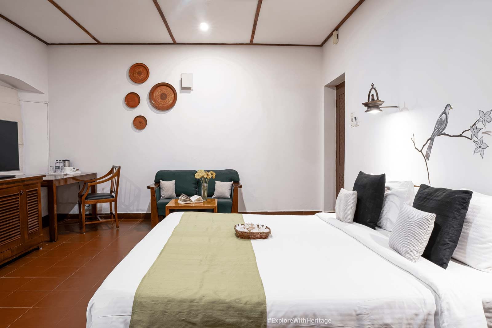 Geoffrey Bawa Room with private plunge-pool terrace and a four-poster bed at Heritage Madurai, Madurai