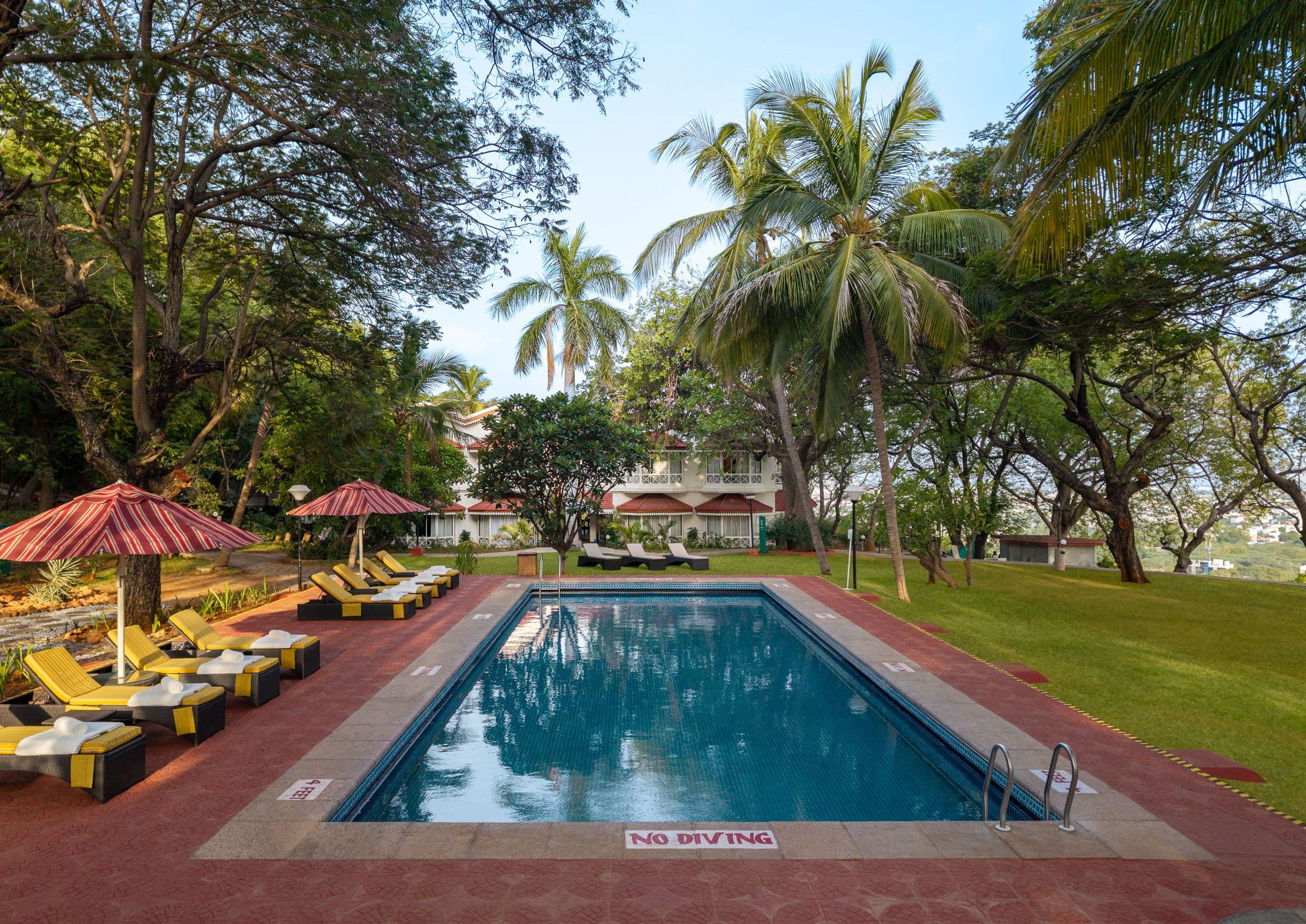 Outdoor swimming pool with city views at Gateway Pasumalai Madurai, IHCL