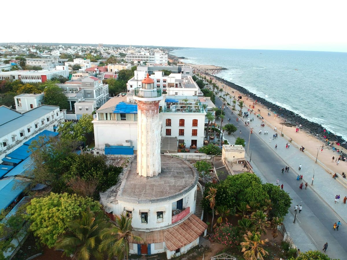 Aerial view of Pondicherry's White Town and the nineteenth-century French lighthouse by the sea.