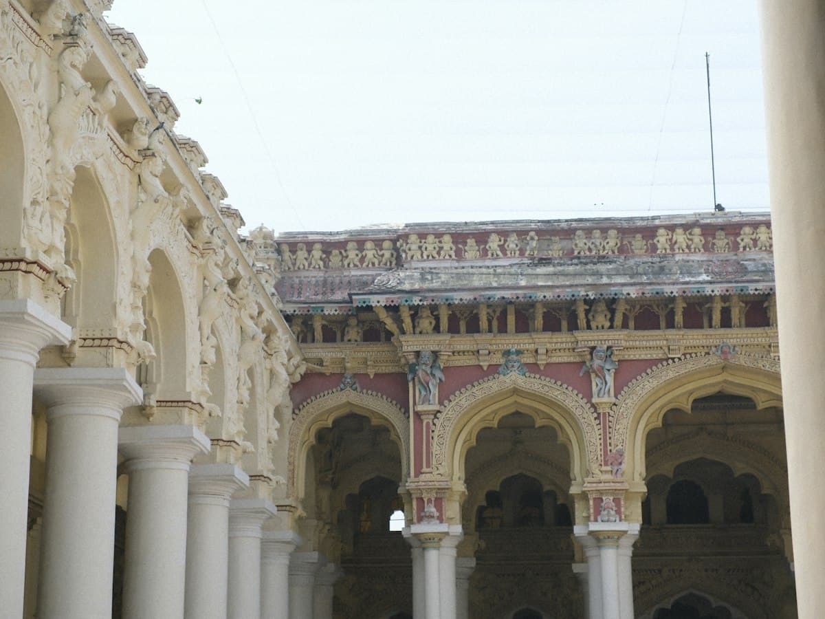 The arched colonnade of pillars at the Thirumalai Nayak Palace in Madurai.