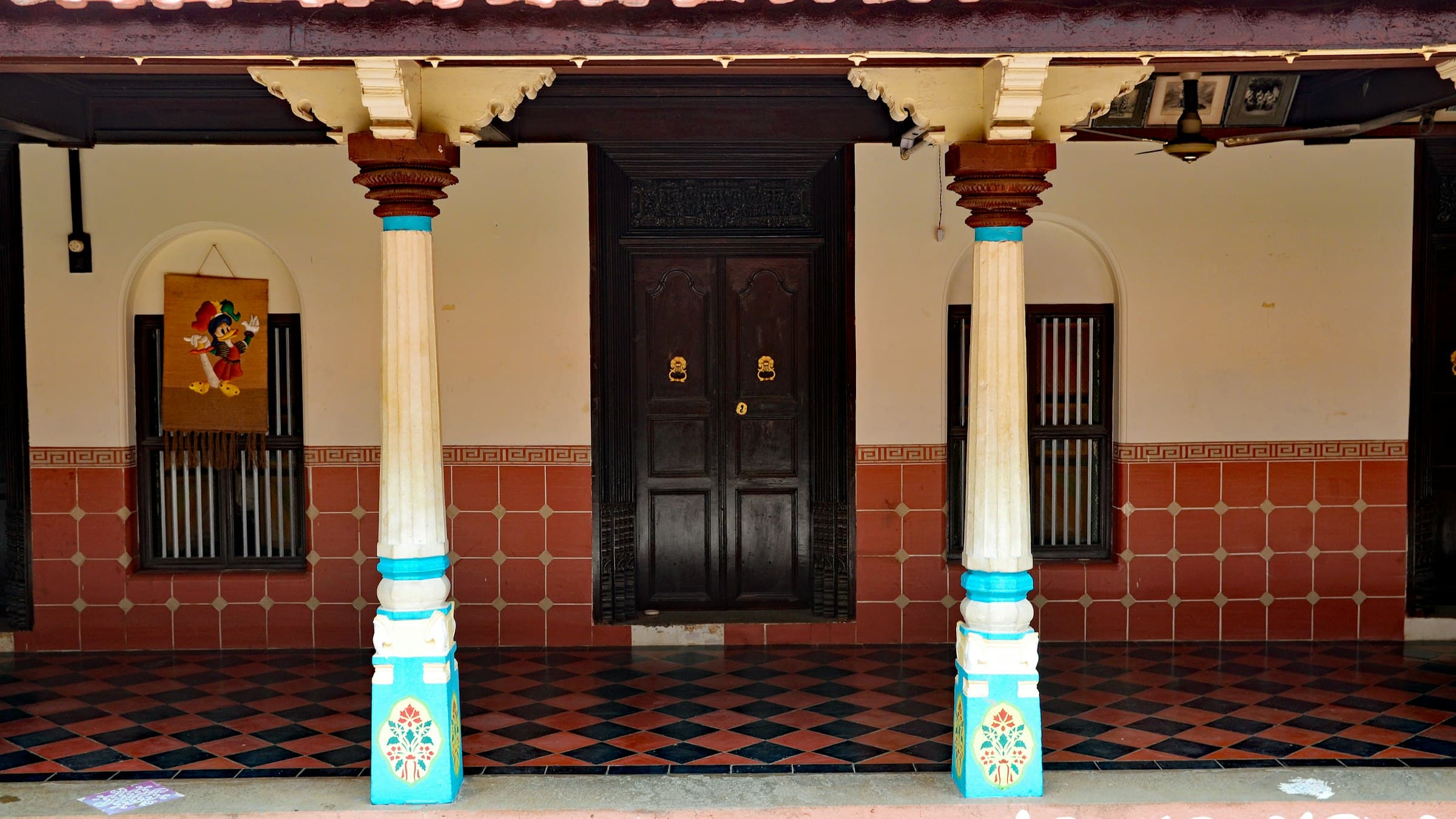 The pillared frontage of a traditional Chettinad mansion with its deep verandah.