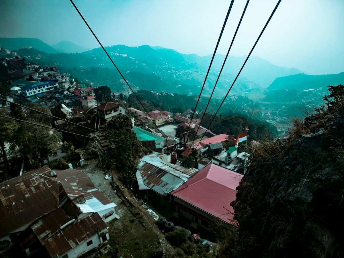 The ropeway ascending toward Gun Hill above Mussoorie's ridgeline town, Uttarakhand