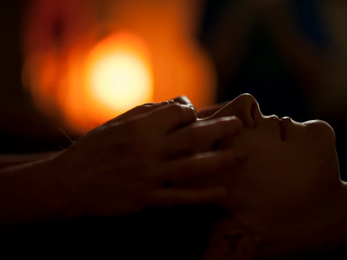 Warm-light spa massage treatment, representative of an Ayurvedic wellness programme