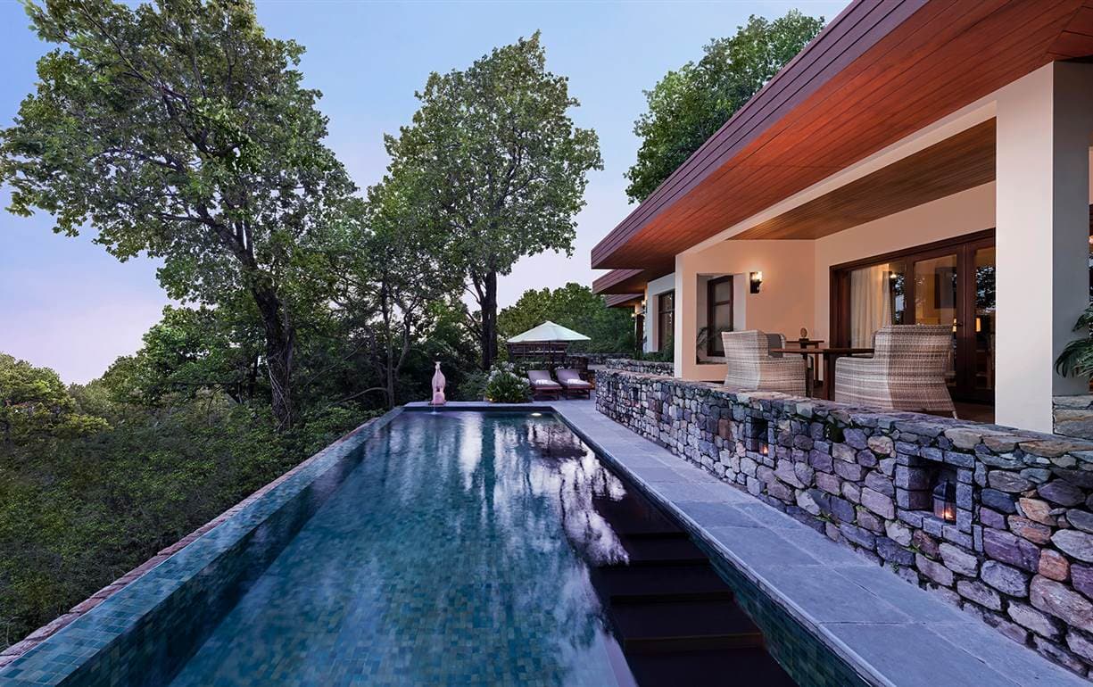 Private plunge pool with garden and forest surrounds at an Ananda Villa, Ananda in the Himalayas.