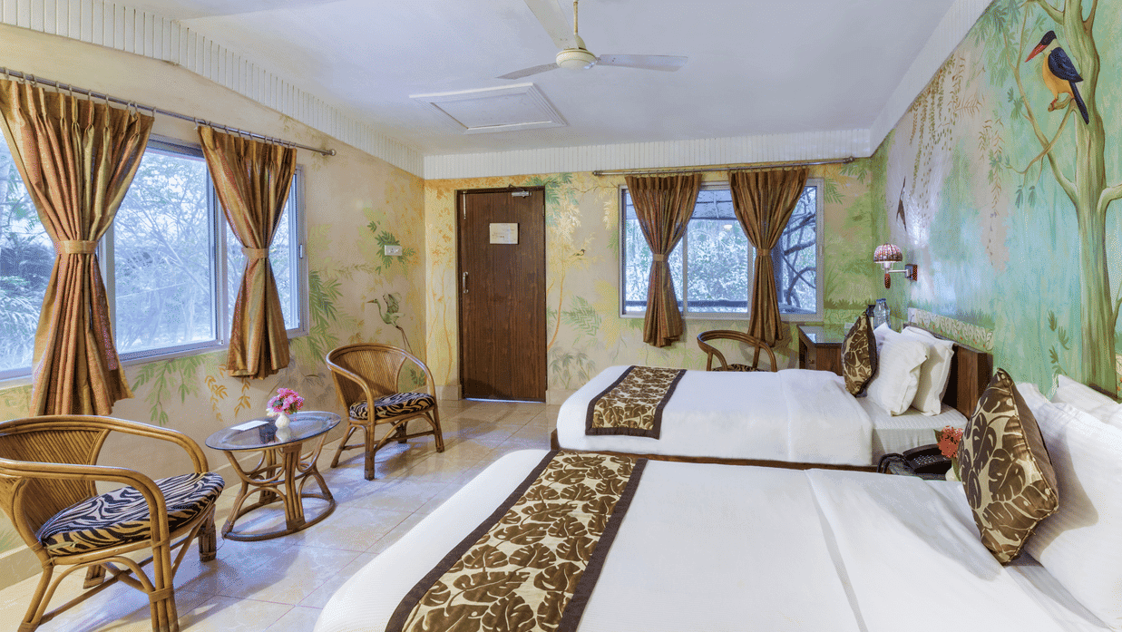 Executive Cottage room interior at Sundarban Tiger Camp, Dayapur Island