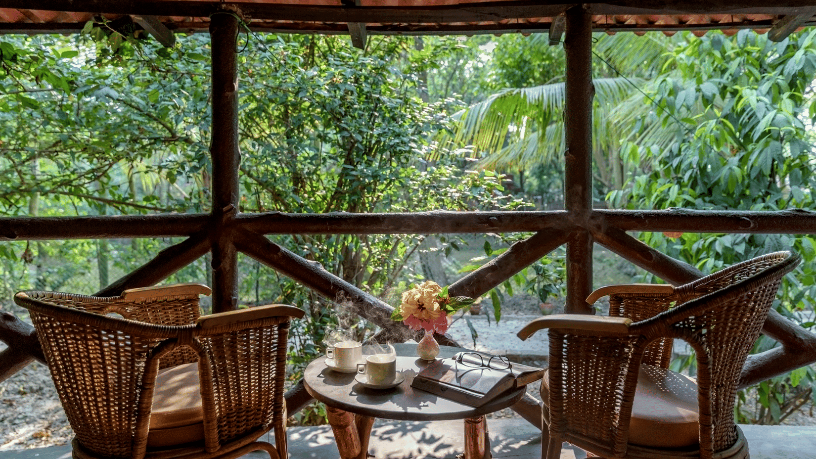 Executive Cottage balcony and seating area at Sundarban Tiger Camp, Dayapur Island