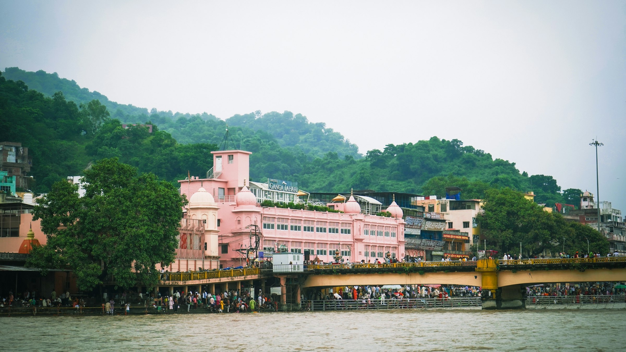 The riverside ghats of Har Ki Pauri in Haridwar, with devotees gathered along the Ganges