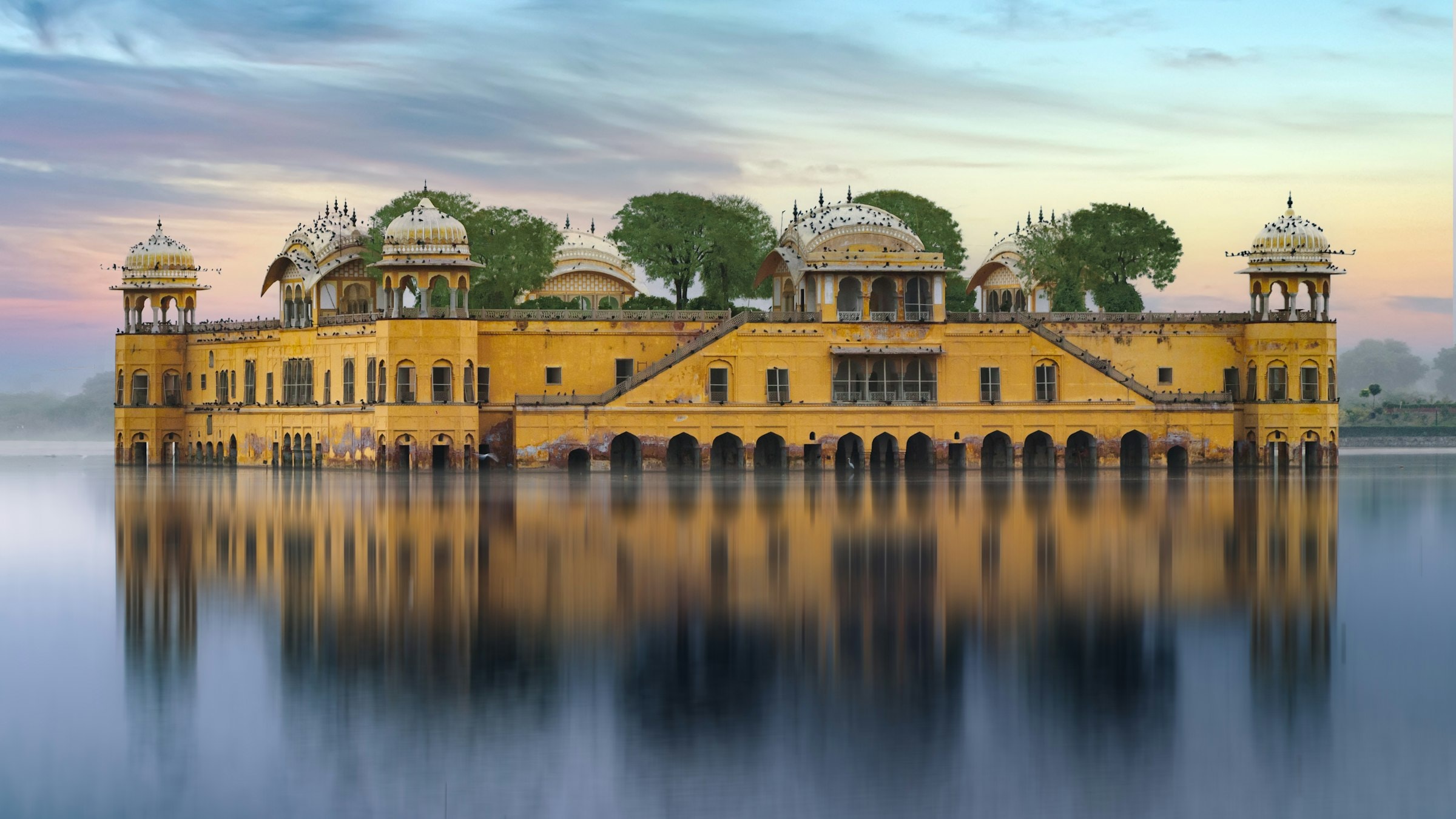 Jal Mahal, the water palace on Man Sagar Lake in Jaipur, its gold-domed roof rising from the water.