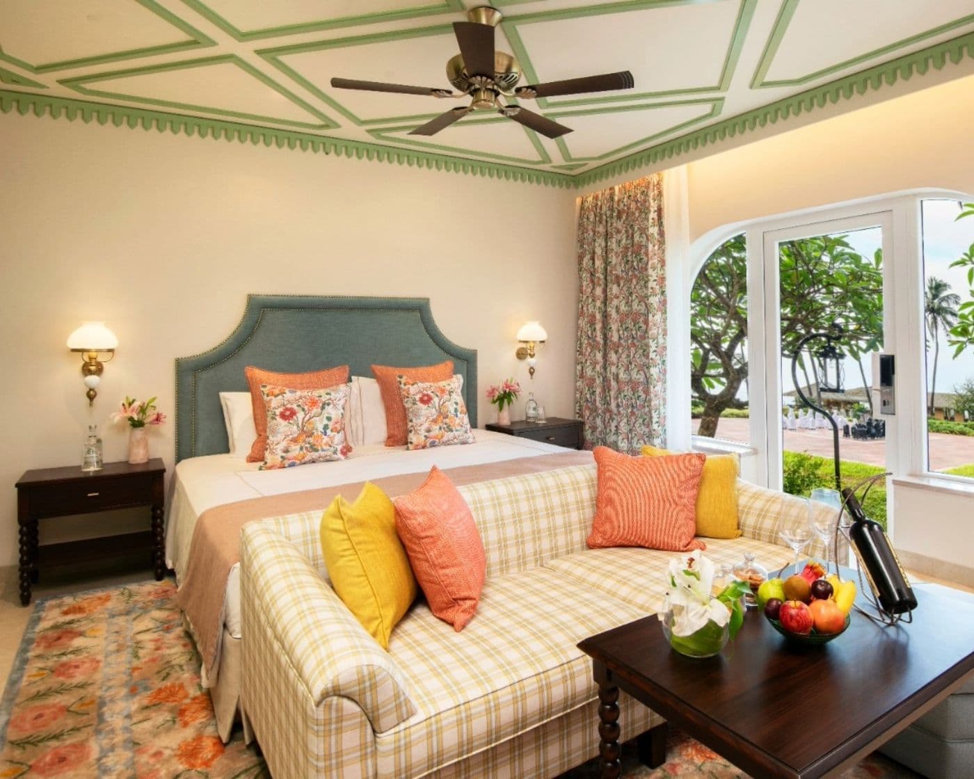 Luxury Room Garden View with king bed and sofa seating at Taj Fort Aguada Resort & Spa