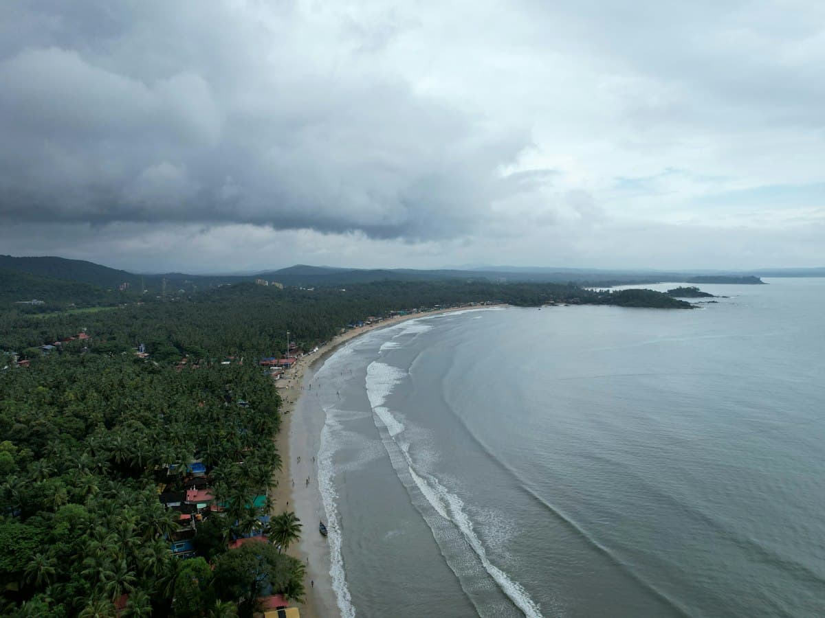 Aerial view of the white-sand crescent of Palolem Beach, South Goa