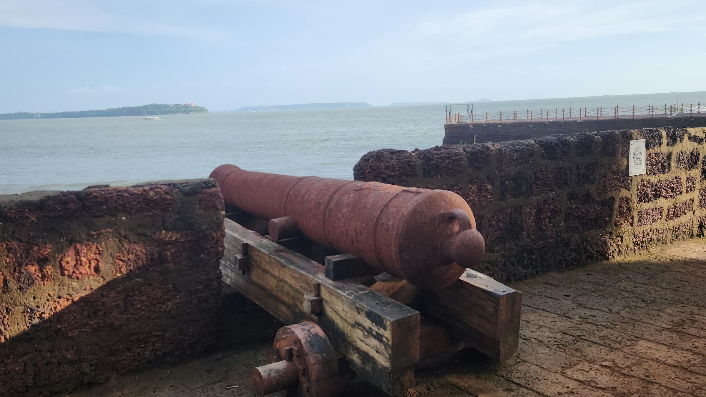 Historic cannon on the ramparts of Fort Aguada above the sea, Goa