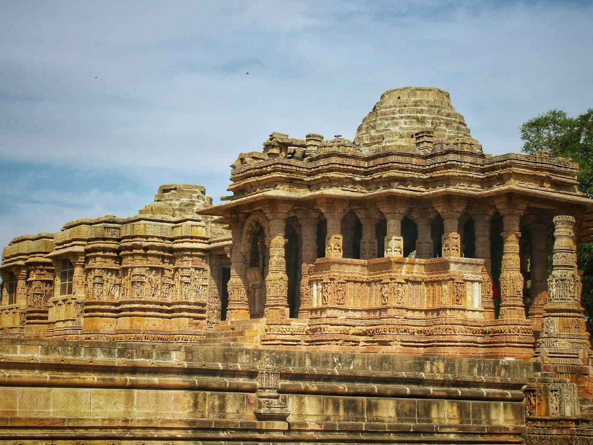The sandstone Sun Temple at Modhera, Gujarat, in daylight with its carved hall and shrine