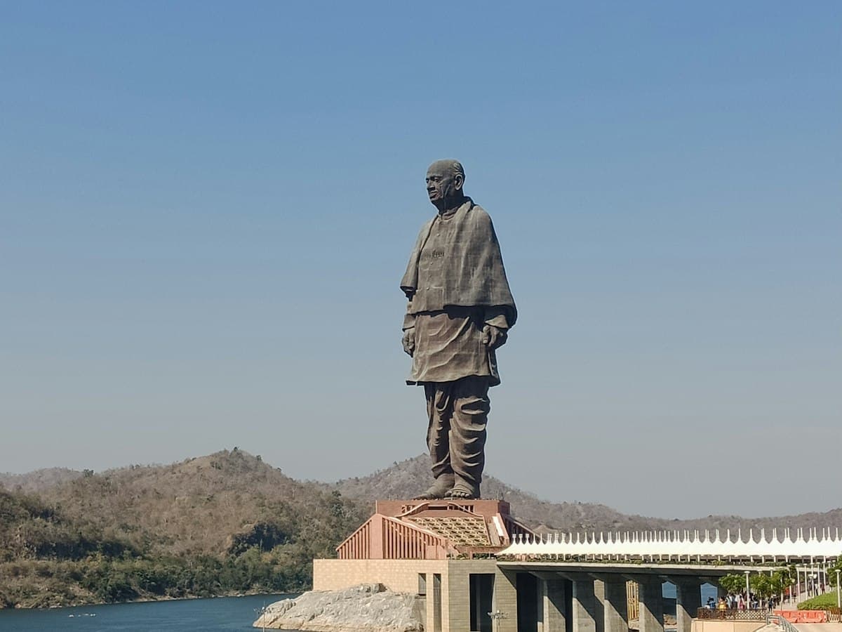 The Statue of Unity of Sardar Vallabhbhai Patel rising above the Narmada, Gujarat, in daylight