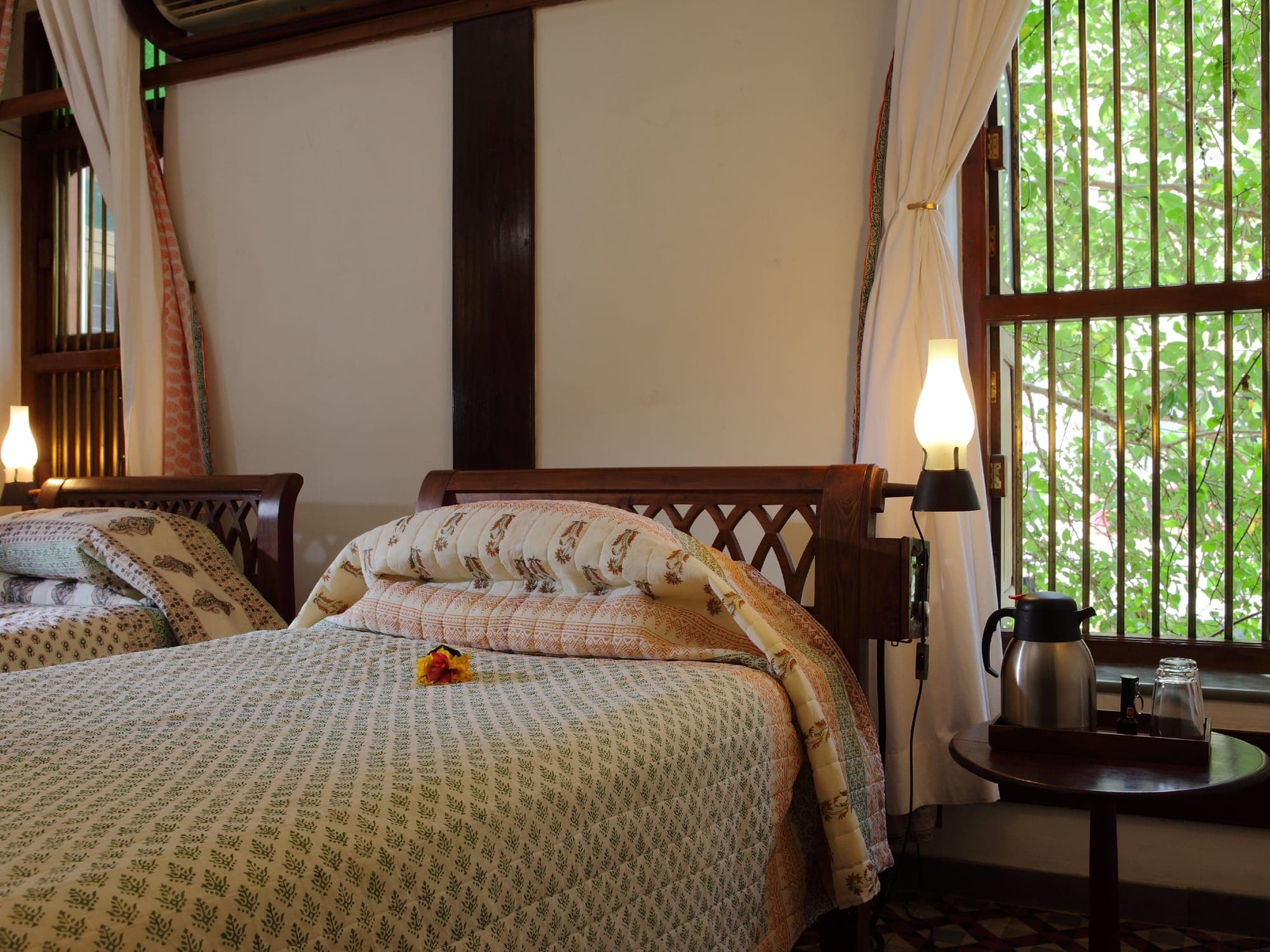 Grand room with a king bed and garden view at The House of MG