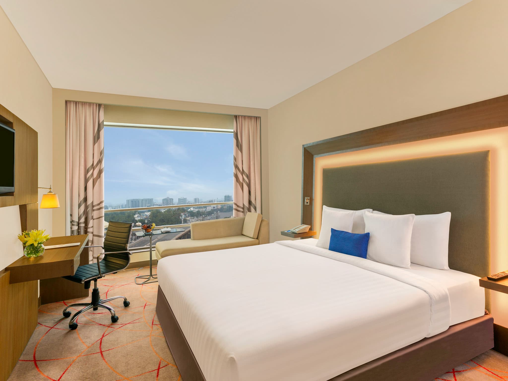 Superior Room with king bed and city view at Novotel Ahmedabad