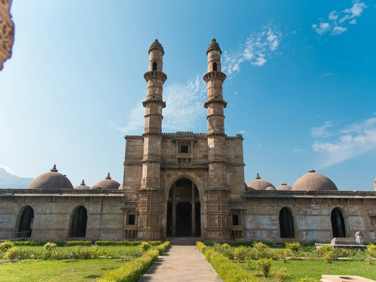 The twin-minaret Jama Masjid at Champaner in the UNESCO-listed Champaner-Pavagadh archaeological park, Gujarat, on a sunny day