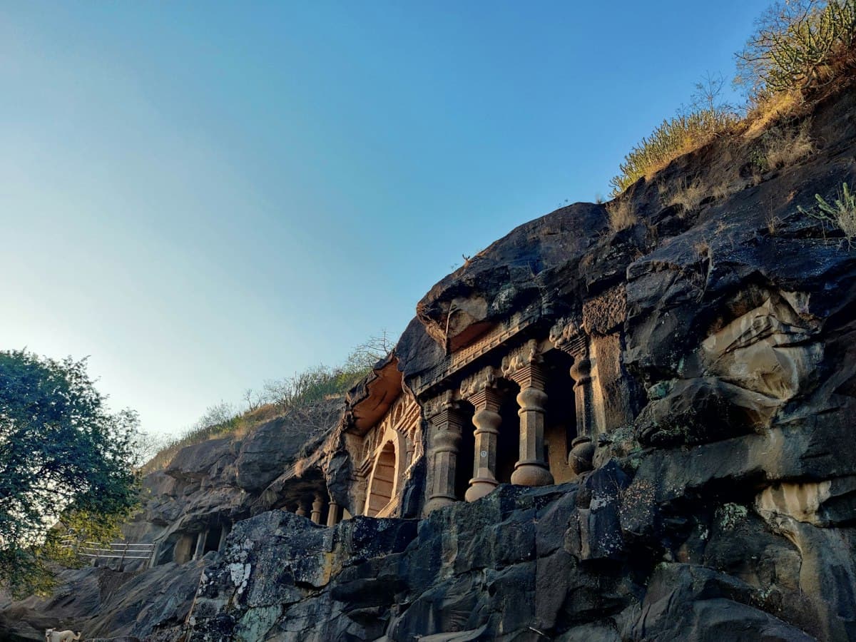 Carved rock pillars of the Pandavleni Caves on the hill above Nashik, Maharashtra