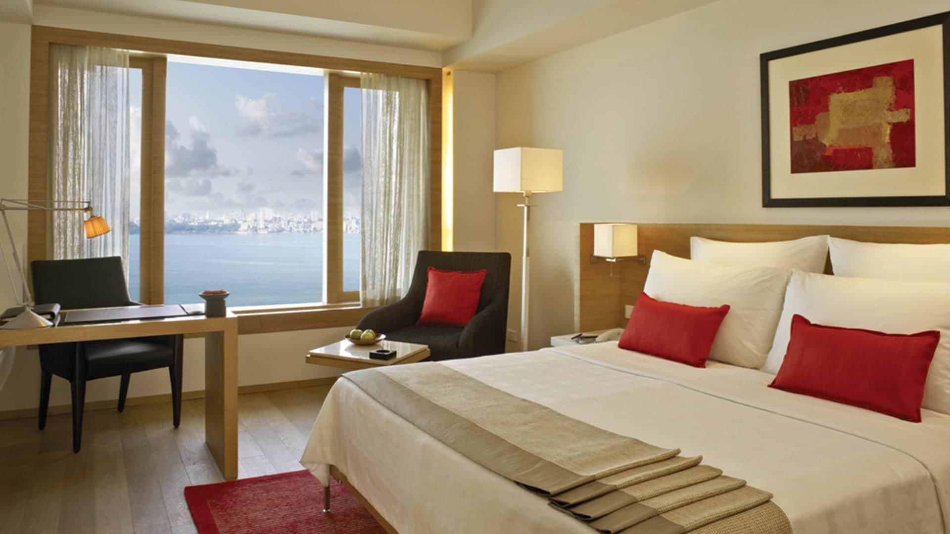 Premier Ocean View Room with king bed, work desk and a wide sea-facing window at Trident, Nariman Point