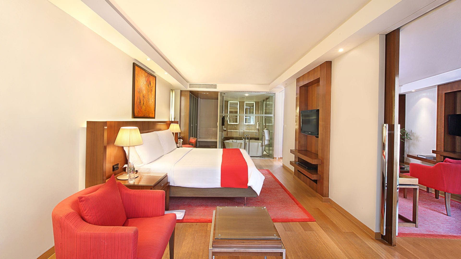 Deluxe Suite with a king bed and sofa seating area at Trident, Bandra Kurla